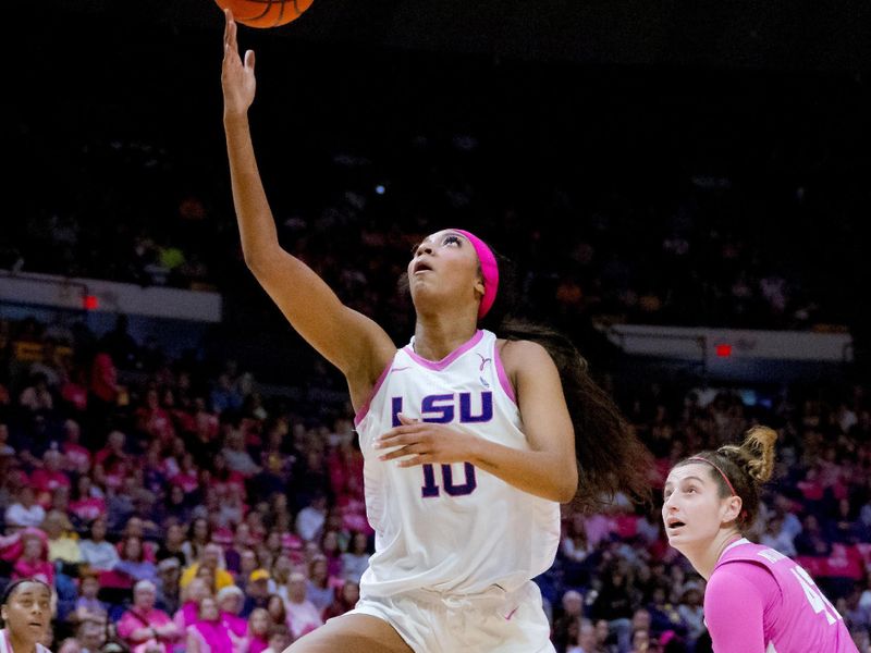 Feb 11, 2024; Baton Rouge, Louisiana, USA; LSU Lady Tigers forward Angel Reese (10) shoots against Alabama Crimson Tide forward Meg Newman (42) during the first half at Pete Maravich Assembly Center. Mandatory Credit: Matthew Hinton-USA TODAY Sports