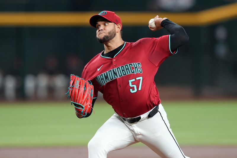 Sep 28, 2024; Phoenix, Arizona, USA; Arizona Diamondbacks pitcher Eduardo Rodriguez (57) pitches against the San Diego Padres during the first inning at Chase Field. Mandatory Credit: Joe Camporeale-Imagn Images