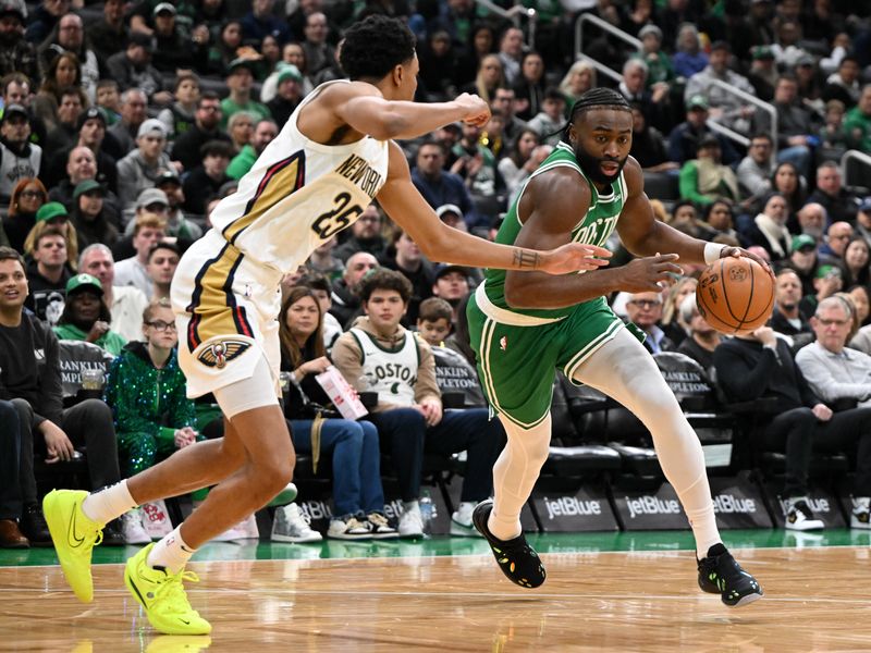 BOSTON, MASSACHUSETTS - JANUARY 12: Jaylen Brown #7 of the Boston Celtics drives to the basket against Trey Murphy III #25 of the New Orleans Pelicans during the first quarter at the TD Garden on January 12, 2025 in Boston, Massachusetts. NOTE TO USER: User expressly acknowledges and agrees that, by downloading and or using this photograph, User is consenting to the terms and conditions of the Getty Images License Agreement. (Photo by Brian Fluharty/Getty Images)