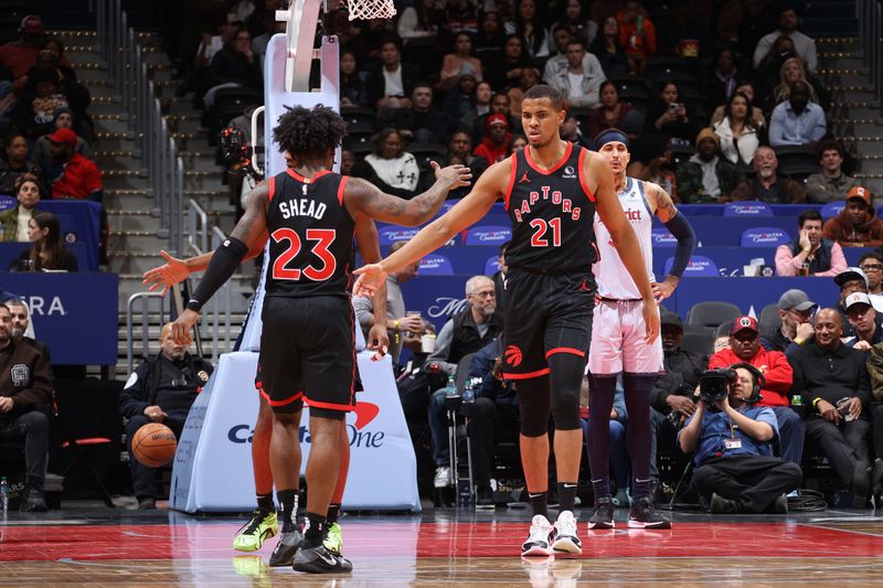 WASHINGTON, DC -?JANUARY 29: Orlando Robinson #21 of the Toronto Raptors high fives Jamal Shead #23 during the game against the Washington Wizards on January 29, 2025 at Capital One Arena in Washington, DC. NOTE TO USER: User expressly acknowledges and agrees that, by downloading and or using this Photograph, user is consenting to the terms and conditions of the Getty Images License Agreement. Mandatory Copyright Notice: Copyright 2025 NBAE (Photo by Kenny Giarla/NBAE via Getty Images)