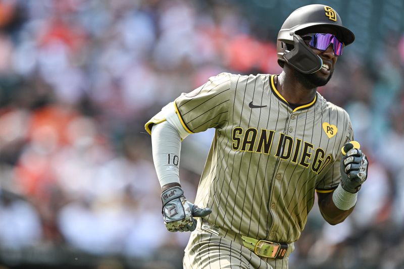 Jul 27, 2024; Baltimore, Maryland, USA; San Diego Padres outfielder Jurickson Profar (10) runs out a first inning single against the Baltimore Orioles  at Oriole Park at Camden Yards. Mandatory Credit: Tommy Gilligan-USA TODAY Sports