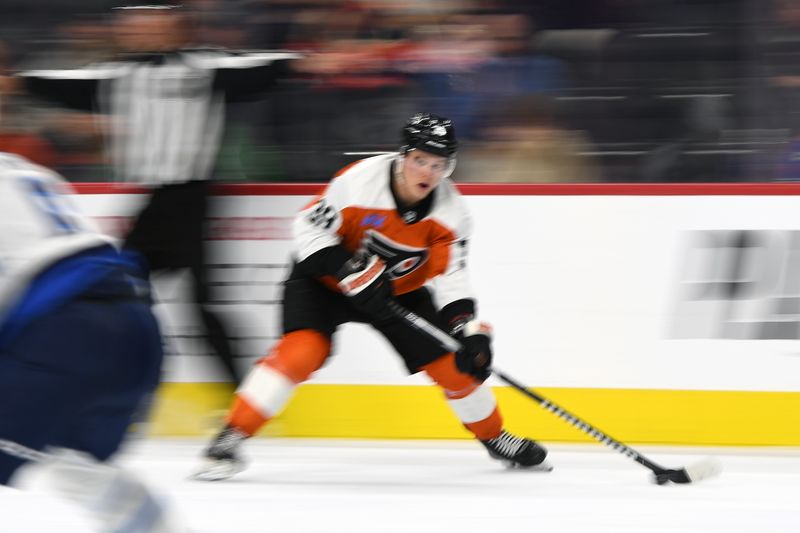 Mar 6, 2025; Philadelphia, Pennsylvania, USA; Philadelphia Flyers right wing Matvei Michkov (39) skates with the puck against the Winnipeg Jets during the third period at Wells Fargo Center. Mandatory Credit: Eric Hartline-Imagn Images