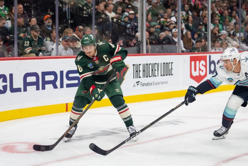 Oct 12, 2024; Saint Paul, Minnesota, USA; Minnesota Wild defenseman Jared Spurgeon (46) clears the puck as Seattle Kraken center Jaden Schwartz (17) presses the attack in the third period at Xcel Energy Center. Mandatory Credit: Matt Blewett-Imagn Images