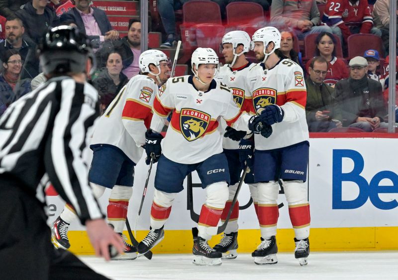 Apr 2, 2024; Montreal, Quebec, CAN; Florida Panthers forward Anton Lundell (15) celebrates with teammates after scoring a goal against the Montreal Canadiens during the first period at the Bell Centre. Mandatory Credit: Eric Bolte-USA TODAY Sports