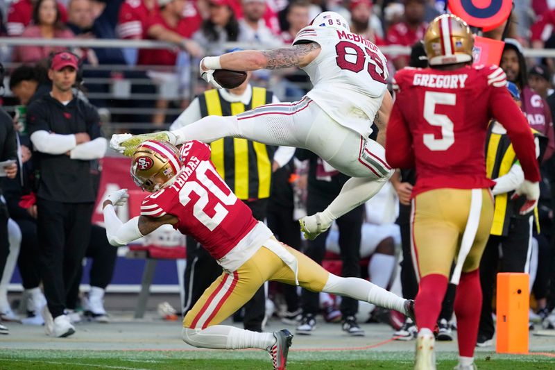 Arizona Cardinals tight end Trey McBride (85) is tackled by San Francisco 49ers cornerback Ambry Thomas (20) during the second half of an NFL football game Sunday, Dec. 17, 2023, in Glendale, Ariz. (AP Photo/Matt York)