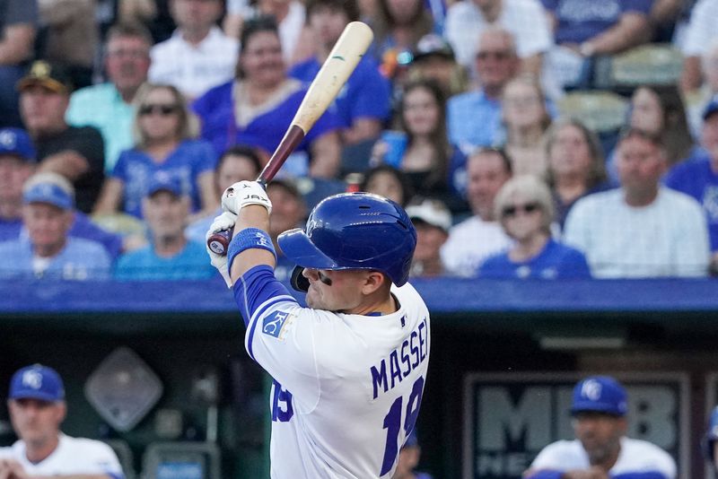 Aug 16, 2023; Kansas City, Missouri, USA; Kansas City Royals second baseman Michael Massey (19) hits a one run sacrifice against the Seattle Mariners in the first inning at Kauffman Stadium. Mandatory Credit: Denny Medley-USA TODAY Sports