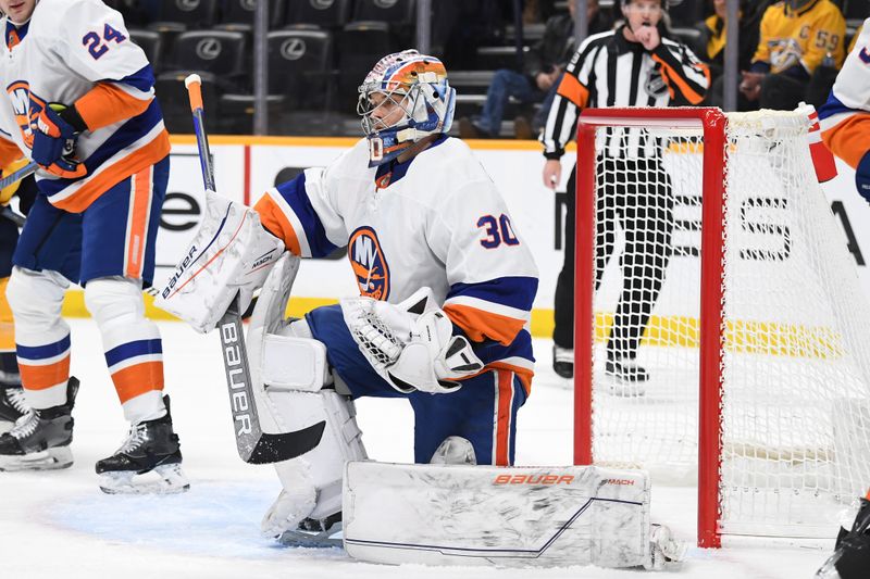 Jan 13, 2024; Nashville, Tennessee, USA; New York Islanders goaltender Ilya Sorokin (30) makes a save during the first period against the Nashville Predators at Bridgestone Arena. Mandatory Credit: Christopher Hanewinckel-USA TODAY Sports