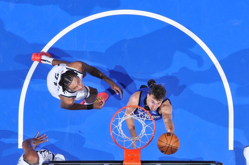 ORLANDO, FL - OCTOBER 25: Franz Wagner #22 of the Orlando Magic drives to the basket during the game against the Brooklyn Nets on October 25, 2024 at Kia Center in Orlando, Florida. NOTE TO USER: User expressly acknowledges and agrees that, by downloading and or using this photograph, User is consenting to the terms and conditions of the Getty Images License Agreement. Mandatory Copyright Notice: Copyright 2024 NBAE (Photo by Fernando Medina/NBAE via Getty Images)