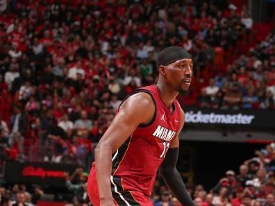 MIAMI, FL - DECEMBER 25:  Bam Adebayo #13 of the Miami Heat handles the ball during the game  on December 25, 2023 at Kaseya Center Arena in Miami, Florida. NOTE TO USER: User expressly acknowledges and agrees that, by downloading and or using this Photograph, user is consenting to the terms and conditions of the Getty Images License Agreement. Mandatory Copyright Notice: Copyright 2023 NBAE (Photo by Issac Baldizon/NBAE via Getty Images)