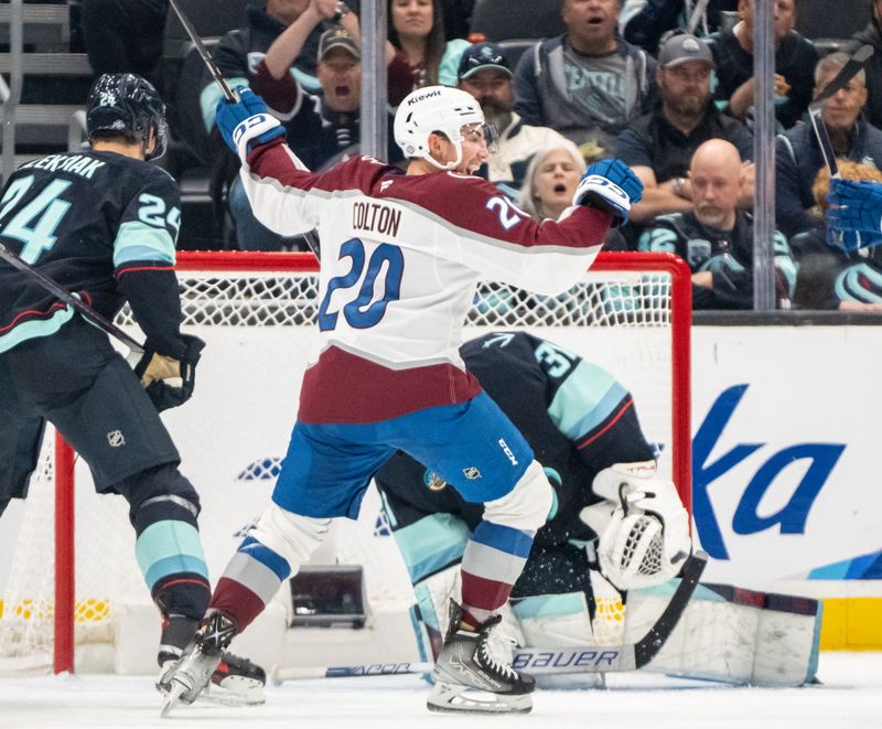 Oct 22, 2024; Seattle, Washington, USA;  Colorado Avalanche forward Ross Colton (20) celebrates a power play goal during the second period against Seattle Kraken at Climate Pledge Arena. Mandatory Credit: Stephen Brashear-Imagn Images