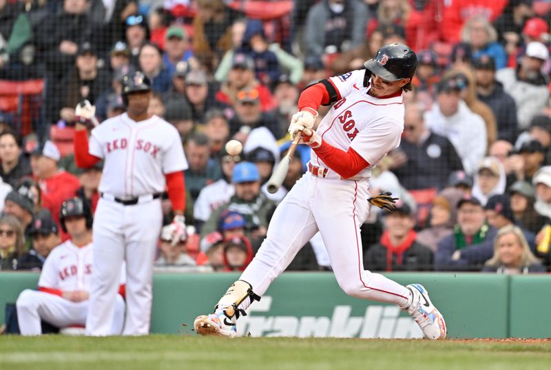 Apr 10, 2025; Boston, Massachusetts, USA; Boston Red Sox left fielder Jarren Duran (16) hits a single against the Toronto Blue Jays during the third inning at Fenway Park. Mandatory Credit: Eric Canha-Imagn Images