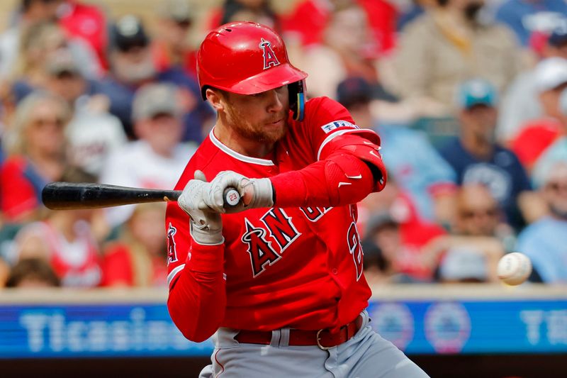 Sep 23, 2023; Minneapolis, Minnesota, USA; Los Angeles Angels second baseman Brandon Drury (23) strikes out looking against the Minnesota Twins in the third inning at Target Field. Mandatory Credit: Bruce Kluckhohn-USA TODAY Sports