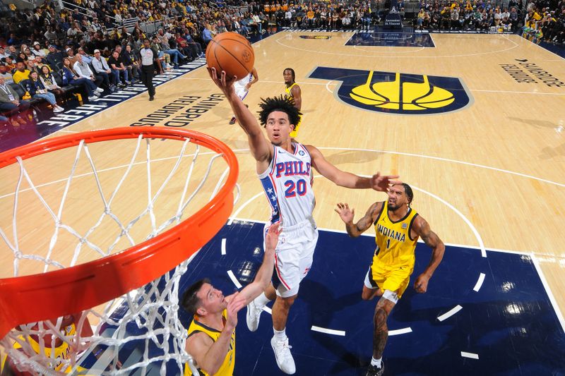 INDIANAPOLIS, IN - OCTOBER 27: Jared McCain #20 of the Philadelphia 76ers drives to the basket during the game against the Indiana Pacers on October 27, 2024 at Gainbridge Fieldhouse in Indianapolis, Indiana. NOTE TO USER: User expressly acknowledges and agrees that, by downloading and or using this Photograph, user is consenting to the terms and conditions of the Getty Images License Agreement. Mandatory Copyright Notice: Copyright 2024 NBAE (Photo by Ron Hoskins/NBAE via Getty Images)