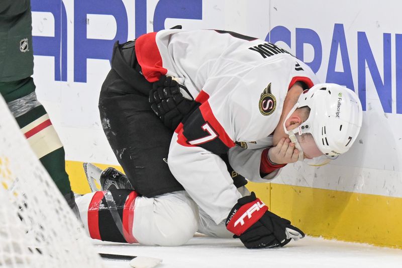 Dec 13, 2025; Saint Paul, Minnesota, USA;  Ottawa Senators forward Brady Tkachuk (7) sells a high sticking cell against the Minnesota Wild during the third period at Grand Casino Arena. Mandatory Credit: Nick Wosika-Imagn Images