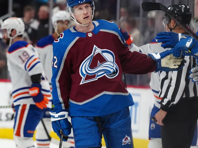 Apr 18, 2024; Denver, Colorado, USA; Colorado Avalanche defenseman Josh Manson (42) celebrates his goal in the first period against the Edmonton Oilers at Ball Arena. Mandatory Credit: Ron Chenoy-USA TODAY Sports