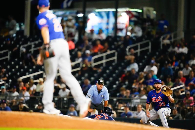 Mar 18, 2023; West Palm Beach, Florida, USA; New York Mets starting pitcher Max Scherzer (21) throws the ball to first baseman Darin Ruf (33) against the Houston Astros during the seventh inning at The Ballpark of the Palm Beaches. Mandatory Credit: Rich Storry-USA TODAY Sports