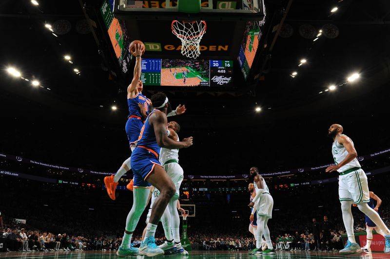 BOSTON, MA - APRIL 11: Donte Divincenzo #0 of the New York Knicks drives to the basket during the game against the Boston Celtics on April 11, 2024 at the TD Garden in Boston, Massachusetts. NOTE TO USER: User expressly acknowledges and agrees that, by downloading and or using this photograph, User is consenting to the terms and conditions of the Getty Images License Agreement. Mandatory Copyright Notice: Copyright 2024 NBAE  (Photo by Brian Babineau/NBAE via Getty Images)