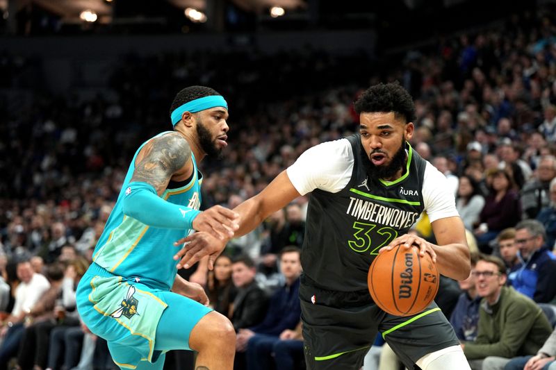 MINNEAPOLIS, MN -  JANUARY 22: Karl-Anthony Towns #32 of the Minnesota Timberwolves drives to the basket during the game against the Charlotte Hornets on January 22, 2024 at Target Center in Minneapolis, Minnesota. NOTE TO USER: User expressly acknowledges and agrees that, by downloading and or using this Photograph, user is consenting to the terms and conditions of the Getty Images License Agreement. Mandatory Copyright Notice: Copyright 2024 NBAE (Photo by Jordan Johnson/NBAE via Getty Images)