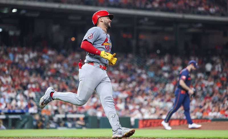 Jun 3, 2024; Houston, Texas, USA; Houston Astros starting pitcher Justin Verlander (35) reacts and St. Louis Cardinals catcher Ivan Herrera (48) runs to first base on a single during the fourth inning at Minute Maid Park. Mandatory Credit: Troy Taormina-USA TODAY Sports