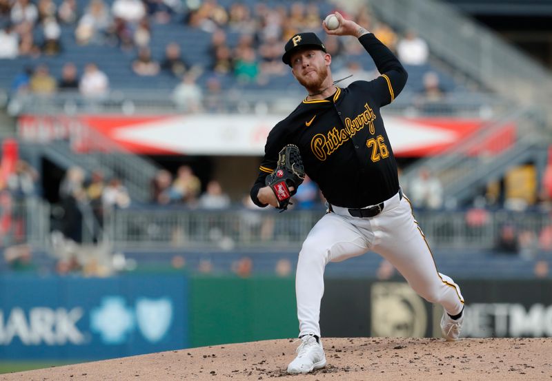 Apr 23, 2024; Pittsburgh, Pennsylvania, USA;  Pittsburgh Pirates starting pitcher Bailey Falter (26) delivers a pitch against the Milwaukee Brewers during the second inning at PNC Park. Mandatory Credit: Charles LeClaire-USA TODAY Sports