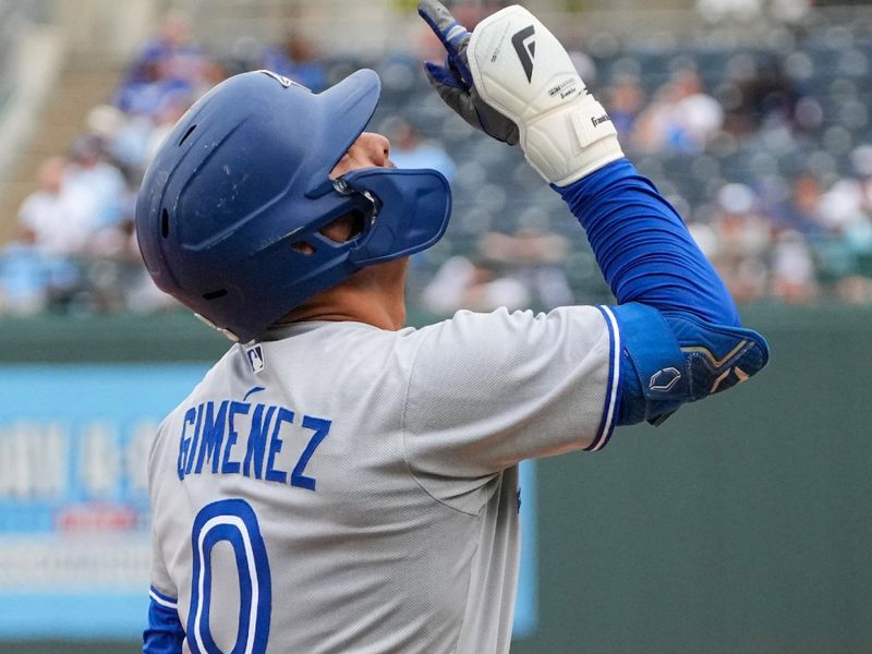 Sep 21, 2025; Kansas City, Missouri, USA; Toronto Blue Jays shortstop Andres Gimenez (0) celebrates after hitting a one run triple against the Kansas City Royals during the eighth inning at Kauffman Stadium. Mandatory Credit: Denny Medley-Imagn Images