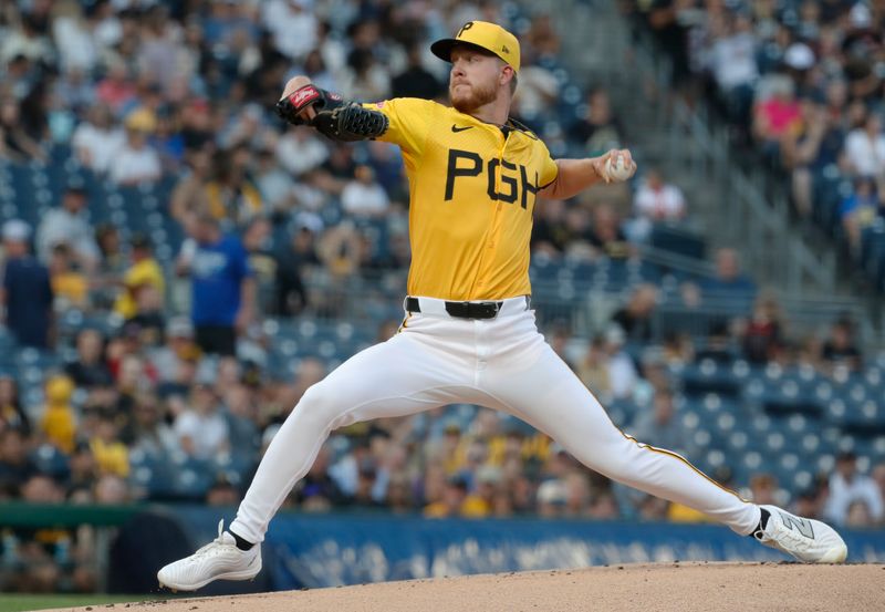 Aug 23, 2024; Pittsburgh, Pennsylvania, USA;  Pittsburgh Pirates starting pitcher Bailey Falter (26) delivers a pitch against the Cincinnati Reds during the first inning at PNC Park. Mandatory Credit: Charles LeClaire-USA TODAY Sports