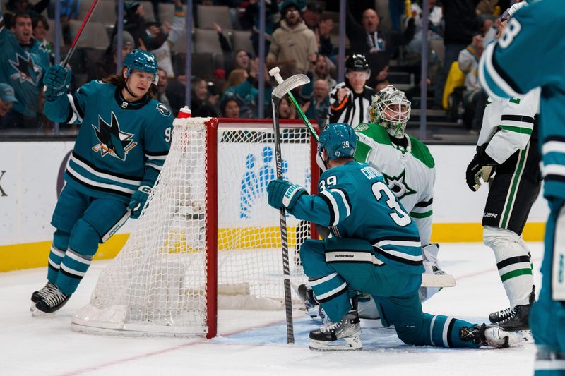 Jan 18, 2023; San Jose, California, USA; San Jose Sharks center Logan Couture (39) celebrates after the goal during the second period against Dallas Stars goaltender Jake Oettinger (29) at SAP Center at San Jose. Mandatory Credit: Neville E. Guard-USA TODAY Sports