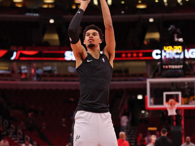 CHICAGO, ILLINOIS - JANUARY 06: Victor Wembanyama #1 of the San Antonio Spurs warms up prior to the game against the Chicago Bulls at the United Center on January 06, 2025 in Chicago, Illinois. NOTE TO USER: User expressly acknowledges and agrees that, by downloading and or using this photograph, User is consenting to the terms and conditions of the Getty Images License Agreement.  (Photo by Michael Reaves/Getty Images)