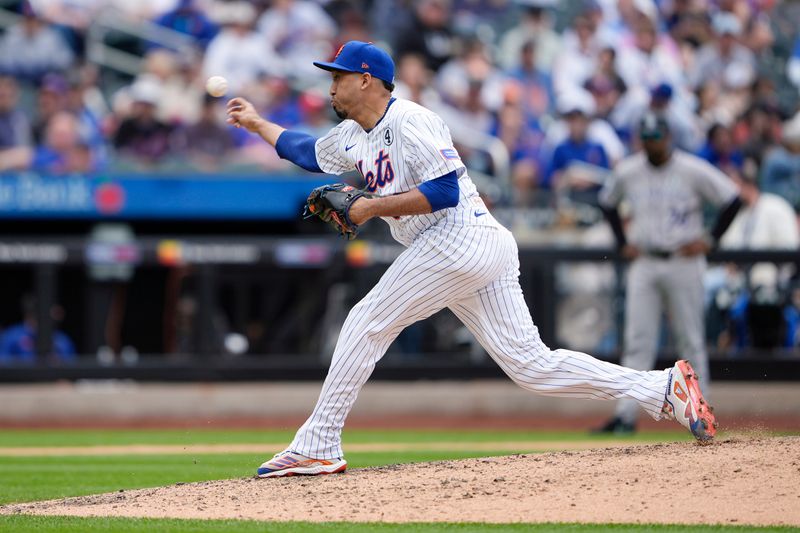 Jun 1, 2025; New York City, New York, USA; New York Mets pitcher Edwin Diaz (39) delivers a pitch against the Colorado Rockies during the ninth inning at Citi Field. Mandatory Credit: Gregory Fisher-Imagn Images