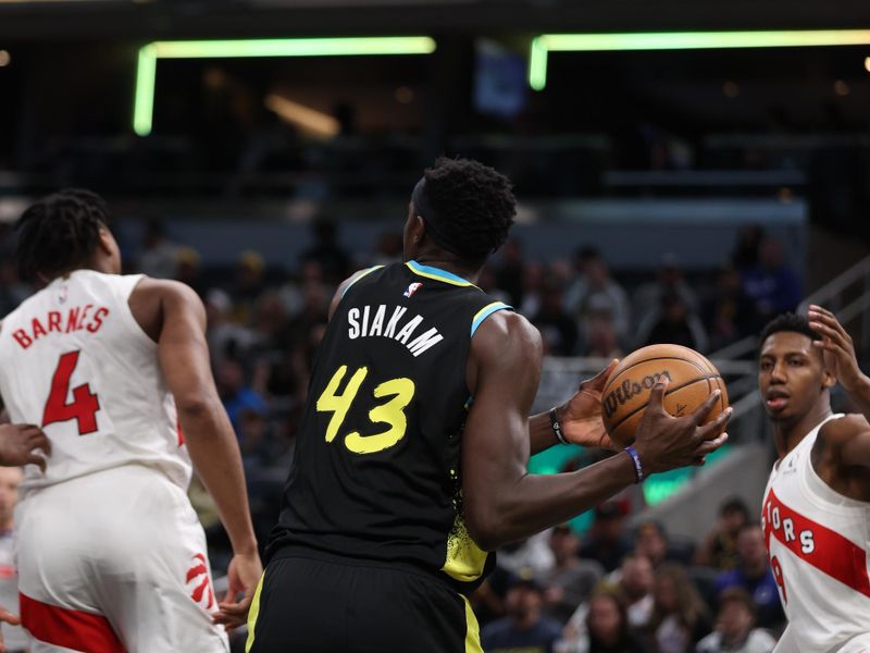 INDIANAPOLIS, IN - FEBRUARY 27: Pascal Siakam #43 of the Indiana Pacers looks to pass the ball during the game against the Toronto Raptors on February 27, 2024 at Gainbridge Fieldhouse in Indianapolis, Indiana. NOTE TO USER: User expressly acknowledges and agrees that, by downloading and or using this Photograph, user is consenting to the terms and conditions of the Getty Images License Agreement. Mandatory Copyright Notice: Copyright 2024 NBAE (Photo by Pepper Robinson/NBAE via Getty Images)