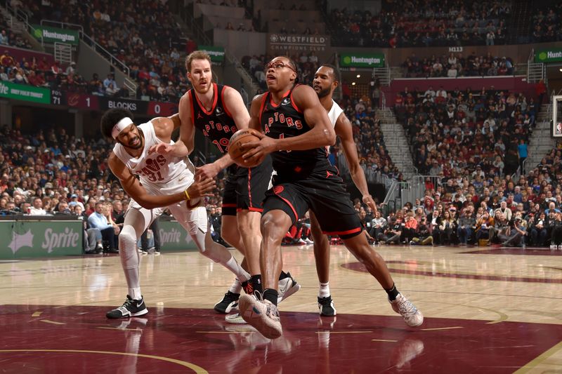 CLEVELAND, OH - NOVEMBER 24: Scottie Barnes #4 of the Toronto Raptors drives to the basket during the game against the Cleveland Cavaliers on November 24, 2024 at Rocket Mortgage FieldHouse in Cleveland, Ohio. NOTE TO USER: User expressly acknowledges and agrees that, by downloading and/or using this Photograph, user is consenting to the terms and conditions of the Getty Images License Agreement. Mandatory Copyright Notice: Copyright 2024 NBAE (Photo by David Liam Kyle/NBAE via Getty Images)