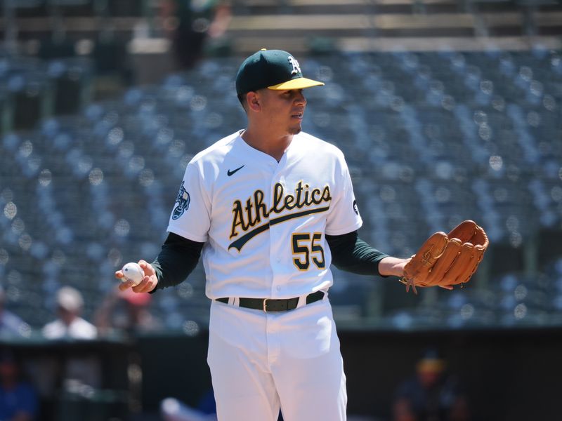 Aug 23, 2023; Oakland, California, USA; Oakland Athletics starting pitcher Adrian Martinez (55) reacts after an automatic ball is called for the Kansas City Royals during the first inning at Oakland-Alameda County Coliseum. Mandatory Credit: Kelley L Cox-USA TODAY Sports