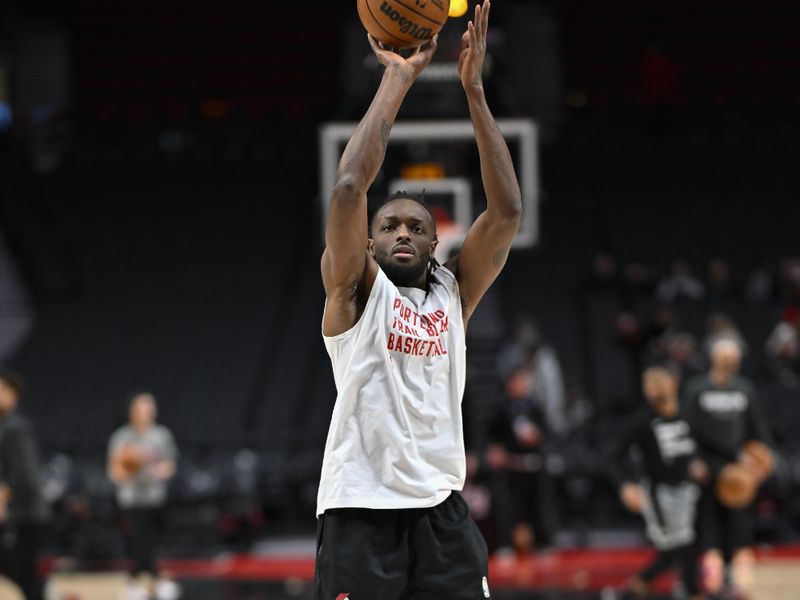 PORTLAND, OREGON - JANUARY 17: Jerami Grant #9 of the Portland Trail Blazers warms up before the game against the Brooklyn Nets at the Moda Center on January 17, 2024 in Portland, Oregon. NOTE TO USER: User expressly acknowledges and agrees that, by downloading and or using this photograph, User is consenting to the terms and conditions of the Getty Images License Agreement. (Photo by Alika Jenner/Getty Images)