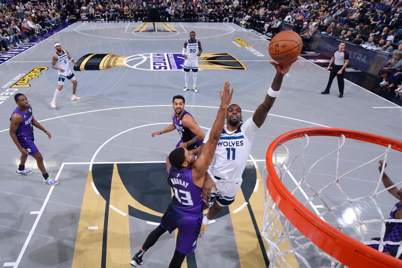 SACRAMENTO, CA - NOVEMBER 15: Naz Reid #11 of the Minnesota Timberwolves drives to the basket during the game against the Sacramento Kings during the Emirates NBA Cup game on November 15, 2024 at Golden 1 Center in Sacramento, California. NOTE TO USER: User expressly acknowledges and agrees that, by downloading and or using this Photograph, user is consenting to the terms and conditions of the Getty Images License Agreement. Mandatory Copyright Notice: Copyright 2024 NBAE (Photo by Rocky Widner/NBAE via Getty Images)