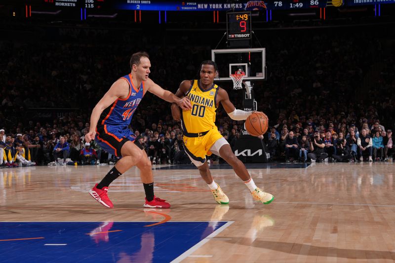 NEW YORK, NY - FEBRUARY 10: Bennedict Mathurin #00 of the Indiana Pacers dribbles the ball during the game against the New York Knicks on February 10, 2024 at Madison Square Garden in New York City, New York.  NOTE TO USER: User expressly acknowledges and agrees that, by downloading and or using this photograph, User is consenting to the terms and conditions of the Getty Images License Agreement. Mandatory Copyright Notice: Copyright 2024 NBAE  (Photo by Jesse D. Garrabrant/NBAE via Getty Images)