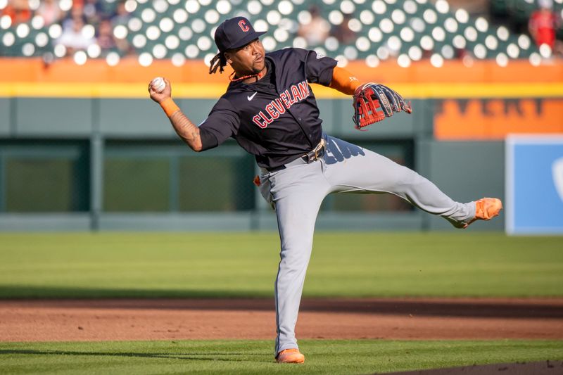 Jul 8, 2024; Detroit, Michigan, USA; Cleveland Guardians third base José Ramírez (11) makes a throw to first base in the first inning against the Detroit Tigers at Comerica Park. Mandatory Credit: David Reginek-USA TODAY Sports