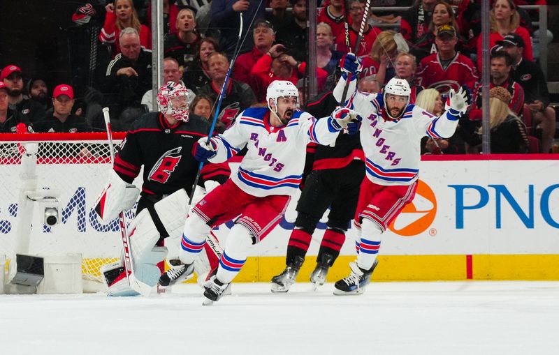 May 16, 2024; Raleigh, North Carolina, USA; New York Rangers left wing Chris Kreider (20) celebrates his goal against the Carolina Hurricanes during the third period in game six of the second round of the 2024 Stanley Cup Playoffs at PNC Arena. Mandatory Credit: James Guillory-USA TODAY Sports