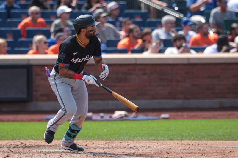 Aug 18, 2024; New York City, New York, USA; Miami Marlins left fielder Derek Hill (58) hits an RBI single during the eighth inning against the New York Mets at Citi Field. Mandatory Credit: Vincent Carchietta-USA TODAY Sports