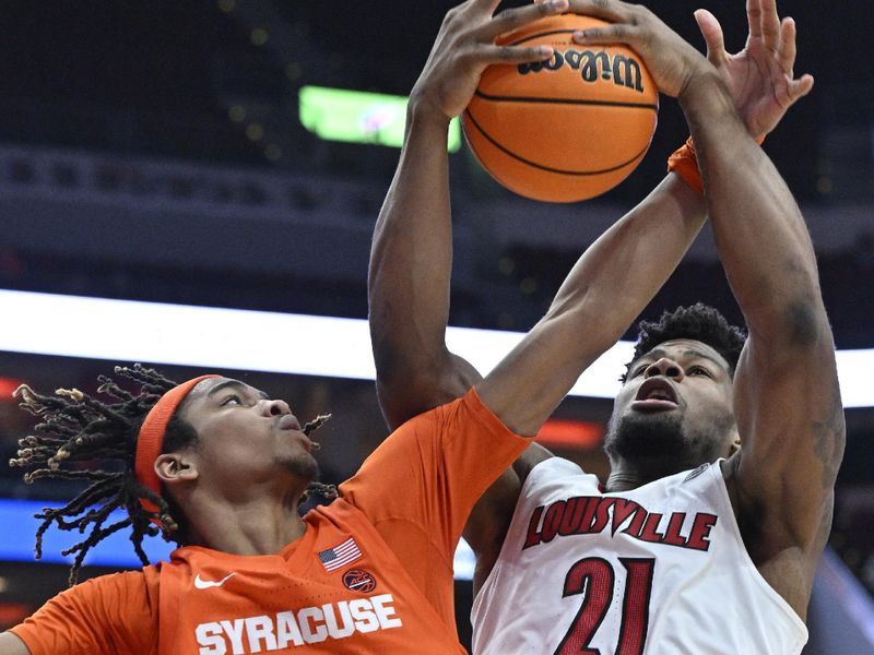 Jan 3, 2023; Louisville, Kentucky, USA; Louisville Cardinals forward Sydney Curry (21) battles Syracuse Orange forward Chris Bell (0) for a rebound during the second half at KFC Yum! Center. Syracuse defeated Louisville 70-69. Mandatory Credit: Jamie Rhodes-USA TODAY Sports