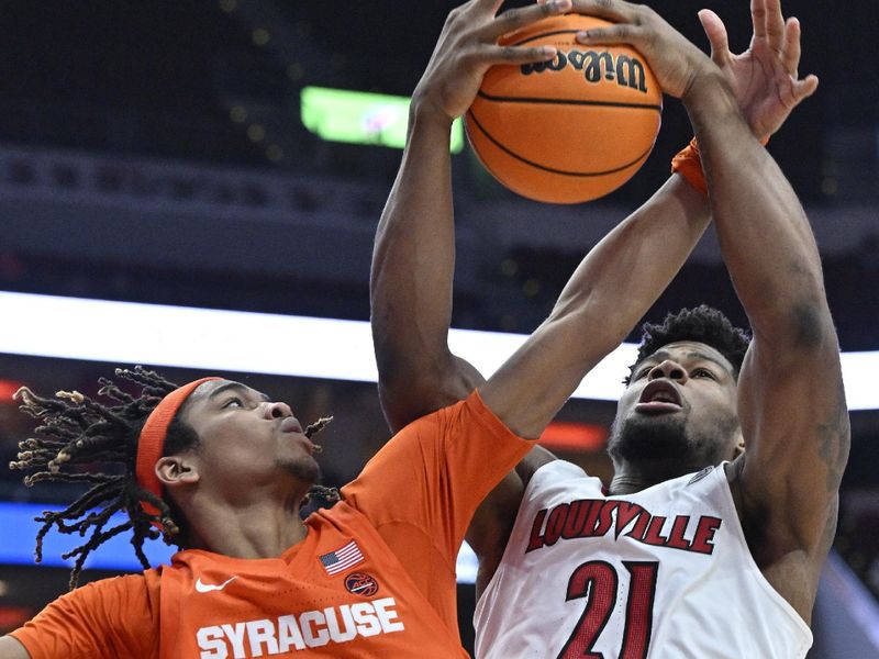 Jan 3, 2023; Louisville, Kentucky, USA; Louisville Cardinals forward Sydney Curry (21) battles Syracuse Orange forward Chris Bell (0) for a rebound during the second half at KFC Yum! Center. Syracuse defeated Louisville 70-69. Mandatory Credit: Jamie Rhodes-USA TODAY Sports