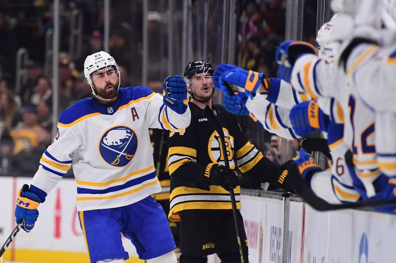 Oct 30, 2025; Boston, Massachusetts, USA;  Buffalo Sabres right wing Alex Tuch (89) is congratulated by teammates after scoring a goal during the third period against the Boston Bruins at TD Garden. Mandatory Credit: Bob DeChiara-Imagn Images