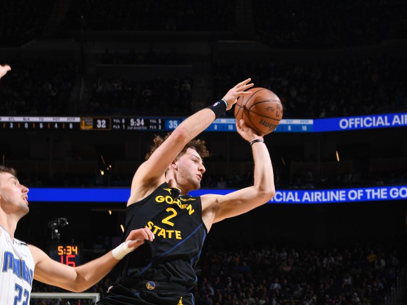 SAN FRANCISCO, CA - FEBRUARY 3: Brandin Podziemski #2 of the Golden State Warriors passes the ball during the game against the Orlando Magic on February 3, 2025 at Chase Center in San Francisco, California. NOTE TO USER: User expressly acknowledges and agrees that, by downloading and or using this photograph, user is consenting to the terms and conditions of Getty Images License Agreement. Mandatory Copyright Notice: Copyright 2025 NBAE (Photo by Noah Graham/NBAE via Getty Images)