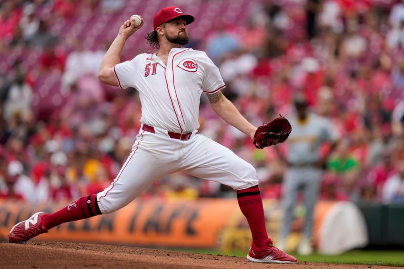 Jun 26, 2024; Cincinnati, Ohio, USA; Cincinnati Reds starting pitcher Graham Ashcroft (51) throws against the Pittsburgh Pirates in the first inning at Great American Ball Park. Mandatory Credit: Sam Greene/The Cincinnati Enquirer-USA TODAY Sports