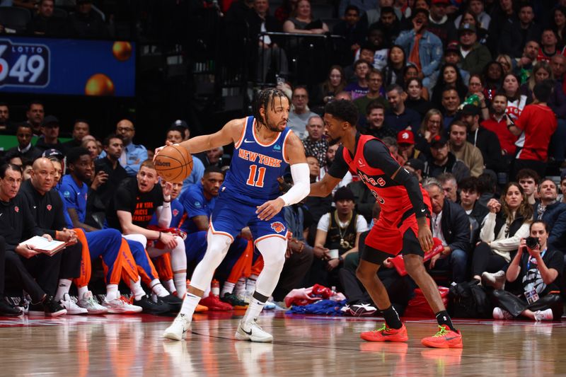 TORONTO, CANADA - MARCH 27: Jalen Brunson #11 of the New York Knicks dribbles the ball during the game against the Toronto Raptors on March 27, 2024 at the Scotiabank Arena in Toronto, Ontario, Canada.  NOTE TO USER: User expressly acknowledges and agrees that, by downloading and or using this Photograph, user is consenting to the terms and conditions of the Getty Images License Agreement.  Mandatory Copyright Notice: Copyright 2024 NBAE (Photo by Vaughn Ridley/NBAE via Getty Images)