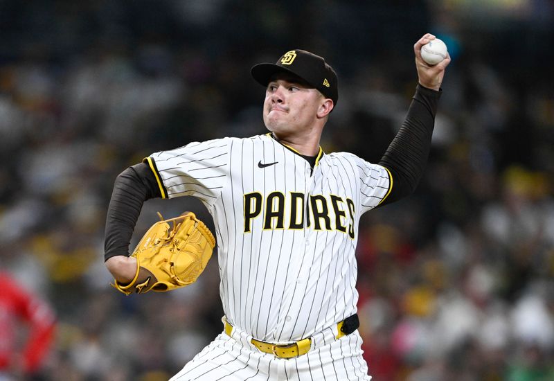 May 14, 2025; San Diego, California, USA; San Diego Padres relief pitcher Adrian Morejon (50) during the eighth inning against the Los Angeles Angels at Petco Park. Mandatory Credit: Denis Poroy-Imagn Images