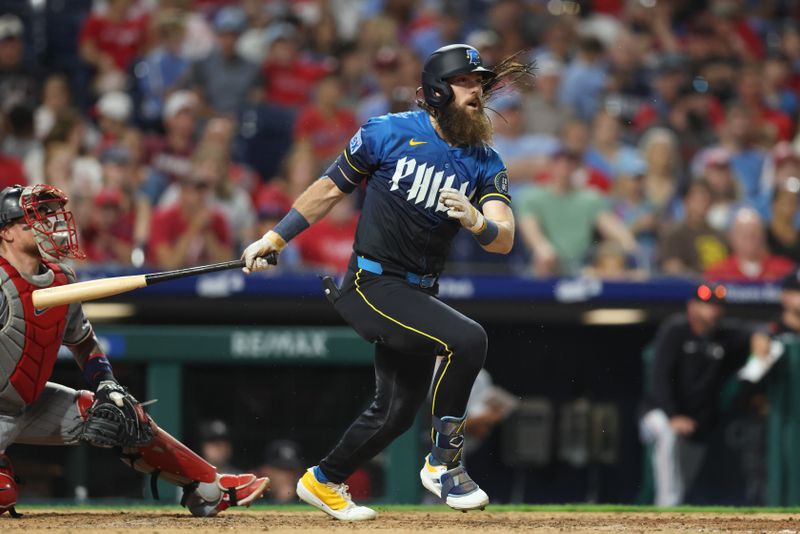 Sep 26, 2025; Philadelphia, Pennsylvania, USA; Philadelphia Phillies outfielder Brandon Marsh (16) hits an RBI double against the Minnesota Twins during the sixth inning at Citizens Bank Park. Mandatory Credit: Bill Streicher-Imagn Images