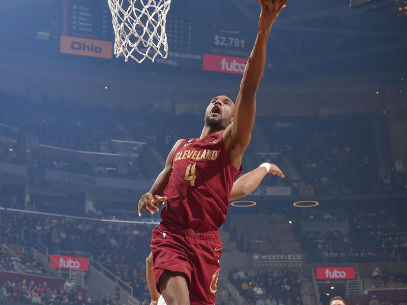 CLEVELAND, OH - FEBUARY 13:  Evan Mobley #4 of the Cleveland Cavaliers goes to the basket during the game  on Febuary 13, 2023 at Rocket Mortgage FieldHouse in Cleveland, Ohio. NOTE TO USER: User expressly acknowledges and agrees that, by downloading and/or using this Photograph, user is consenting to the terms and conditions of the Getty Images License Agreement. Mandatory Copyright Notice: Copyright 2023 NBAE (Photo by David Liam Kyle/NBAE via Getty Images)