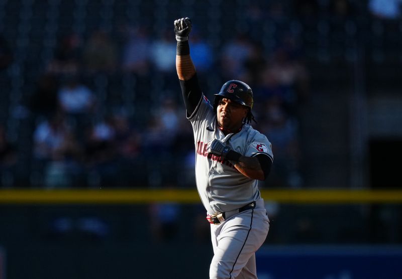 May 28, 2024; Denver, Colorado, USA; Cleveland Guardians third base José Ramírez (11) celebrates his two run home run in the first inning against the Colorado Rockies at Coors Field. Mandatory Credit: Ron Chenoy-USA TODAY Sports