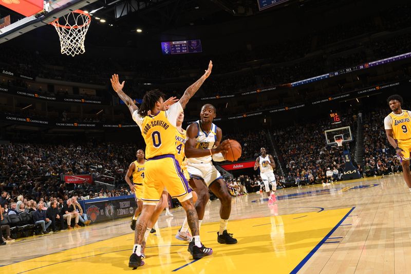 SAN FRANCISCO, CA - OCTOBER 18: Jonathan Kuminga #00 of the Golden State Warriors handles the ball during the game against the Los Angeles Lakers during a NBA Preseason game on October 18, 2024 at Chase Center in San Francisco, California. NOTE TO USER: User expressly acknowledges and agrees that, by downloading and or using this photograph, user is consenting to the terms and conditions of Getty Images License Agreement. Mandatory Copyright Notice: Copyright 2024 NBAE (Photo by Noah Graham/NBAE via Getty Images)