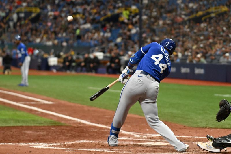 May 25, 2024; St. Petersburg, Florida, USA; Kansas City Royals left fielder hits an RBI sacrifice fly ball in the seventh inning against the Tampa Bay Rays at Tropicana Field. Mandatory Credit: Jonathan Dyer-USA TODAY Sports